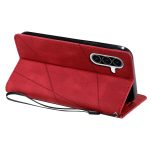 Red wallet-style smartphone case with a built-in stand and wrist strap, shown attached to a phone with a triple-camera module on the back.