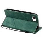 Green geometric-pattern phone case folded to support a smartphone in a stand with a wrist strap