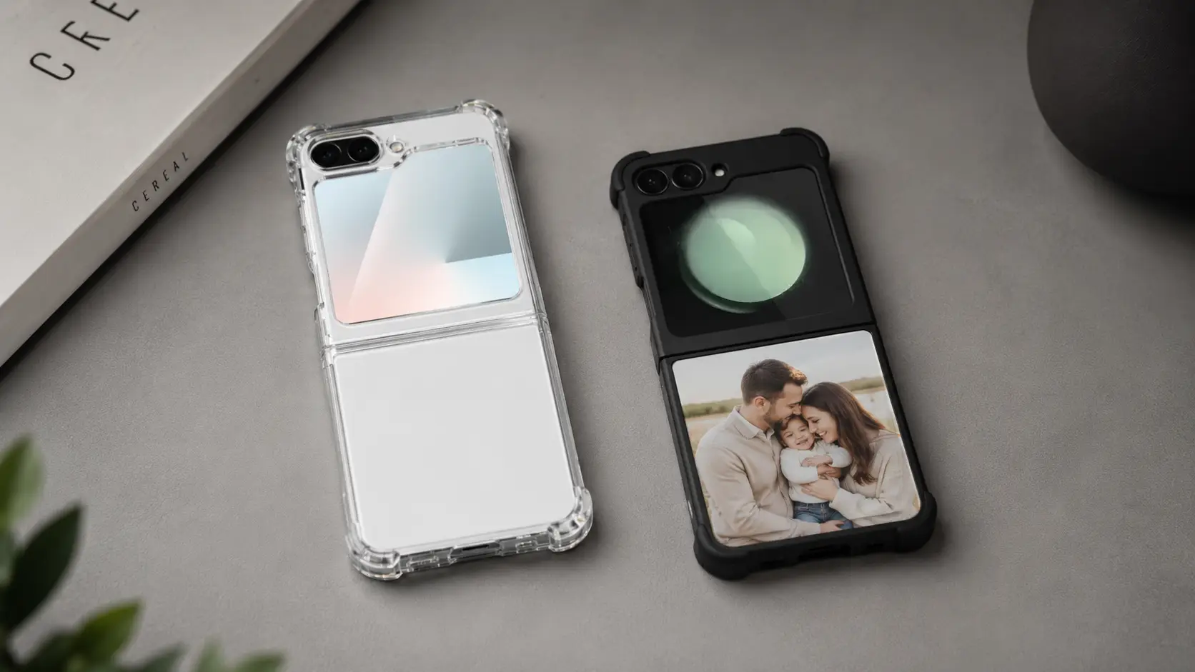 Two foldable smartphones in protective cases lie on a gray surface; clear case on the left, black case on the right with a family photo on the bottom display.