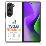 Foldable smartphone shown from the back displaying an advertisement with the logo 'TVOJA FOTOGRAFIJA' in blue and orange, plus small icons and a button that says 'USTVARI SVOJ UNIKAT'.
