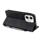Elegantna_flip_line_torbica-Honor_600_Lite-crna-7 | Poceni-Ovitki.si Black leather-style phone case with built-in stand and strap, angled to show the camera cutout and protective coverwork on the back of a smartphone.