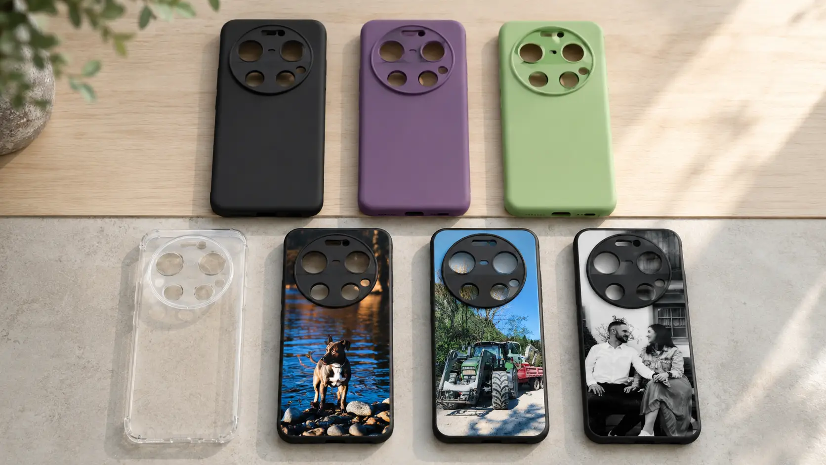 Row of colorful phone cases with large circular camera rings on top. Clear case is transparent. Photos show three cases with dog, tractor, and couple designs on back.