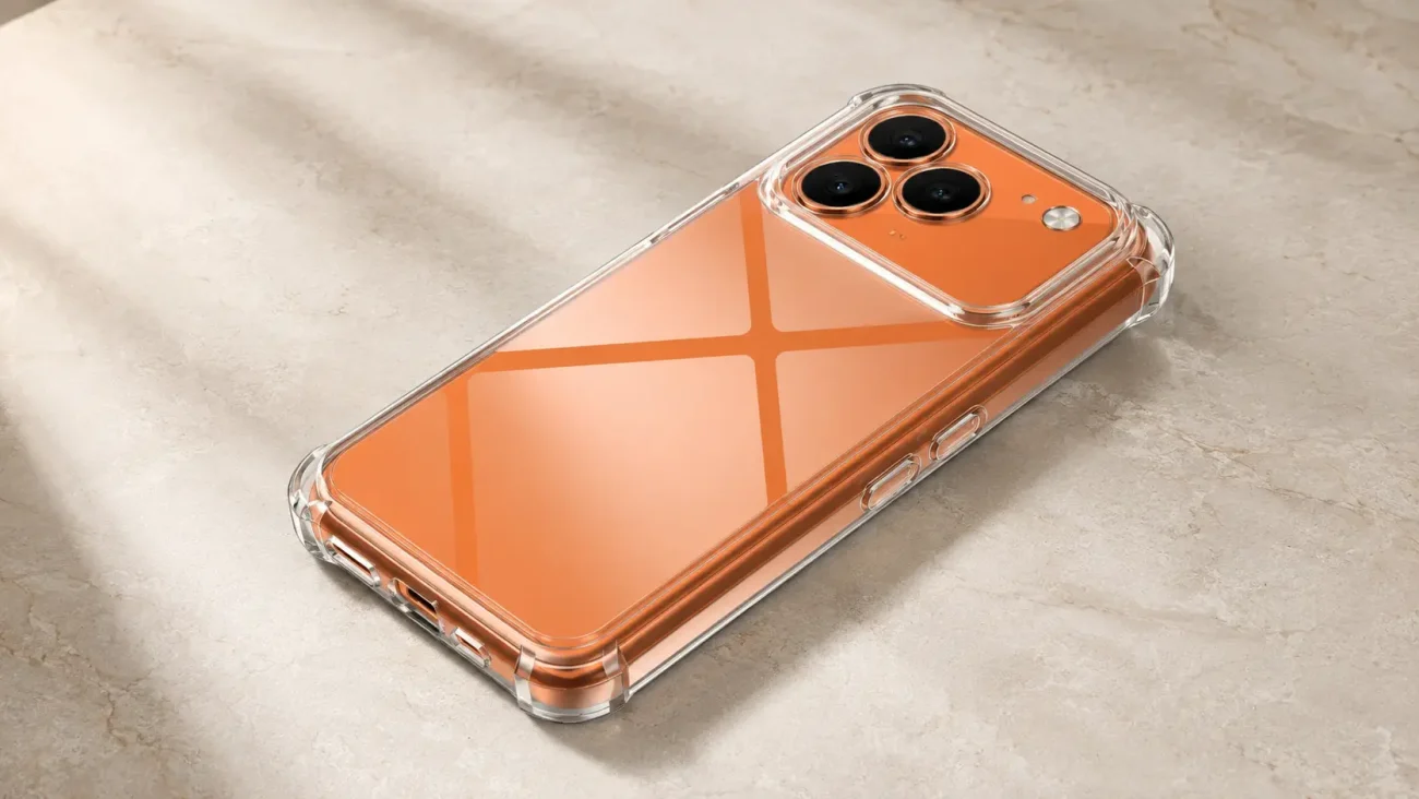 Orange iPhone in a clear protective case lying on a light stone surface, showing its triple-camera setup and back design