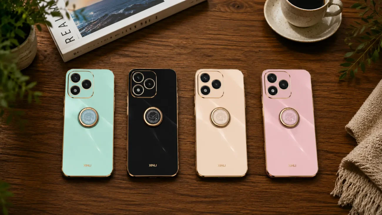 Platinum ring Ovitki za Honor 400 Lite | Poceni-Ovitki.si Four smartphones with triple cameras and circular back mounts in mint green, black, gold, and pink lie on a wooden table beside a coffee cup and a magazine.